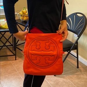 Tory Burch Orange cross bag.